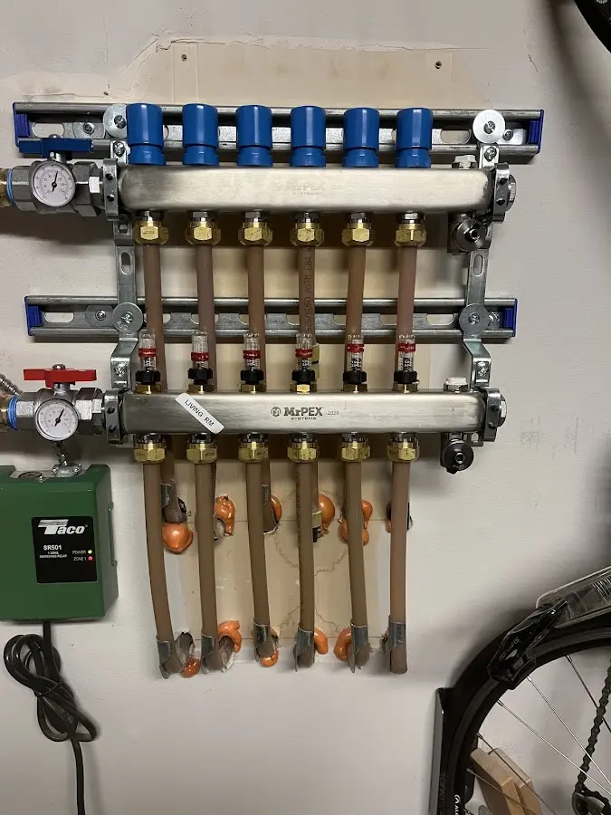 Plumber performing Water Heater Repair at a residential property in Twin Lakes